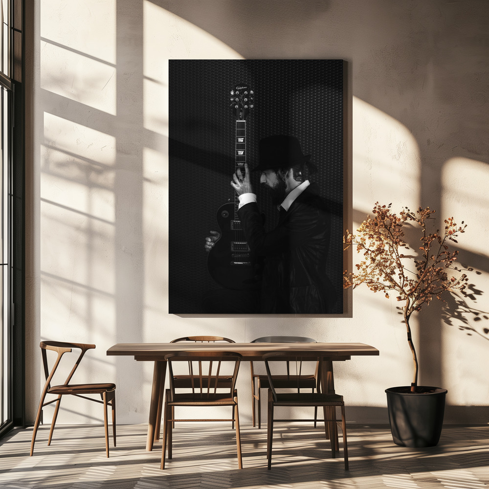 Canvas print - Man in black over dining table