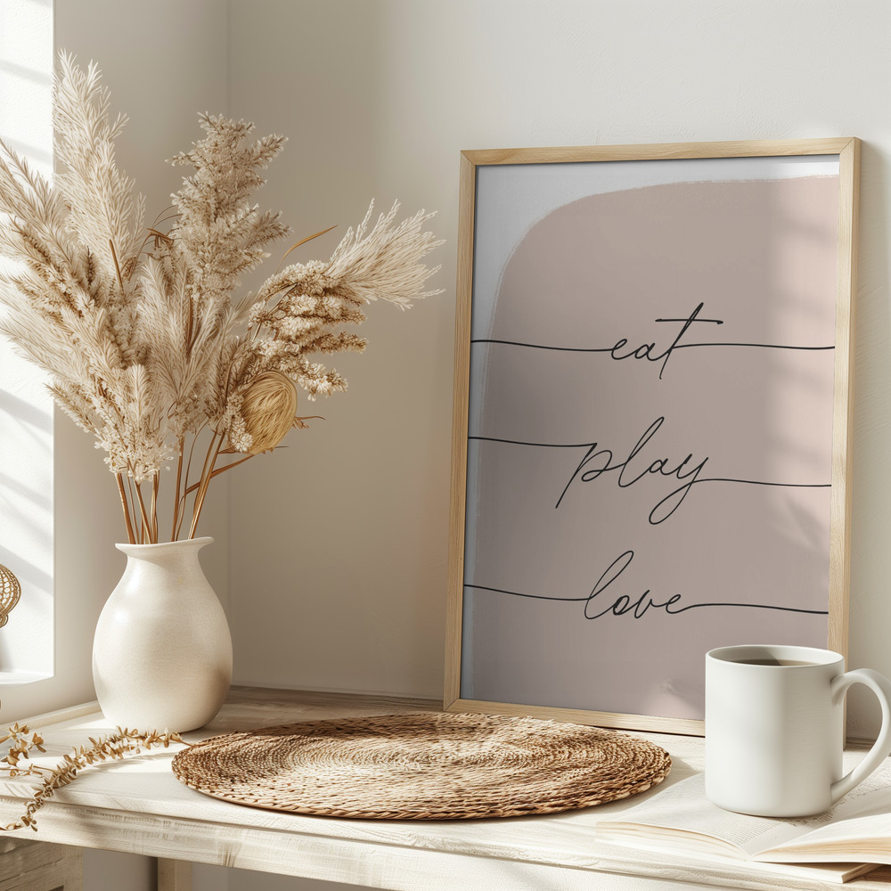 Poster - Eat Play Love auf dem Tisch